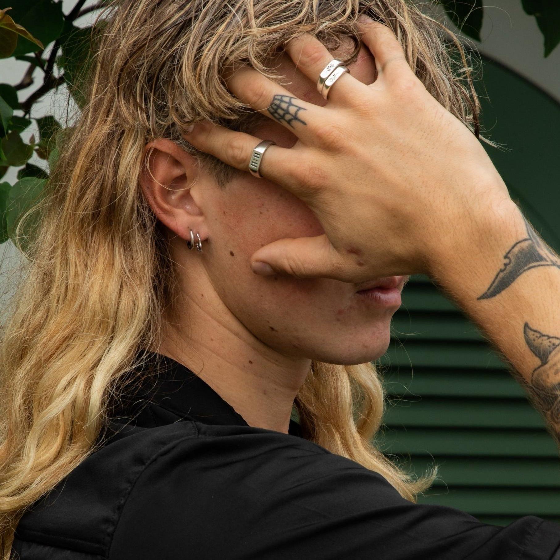 Model showcasing Billie Jo earrings and matching bracelet