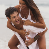 Detailed close-up of Billie Jo rings on fingers in natural lighting.